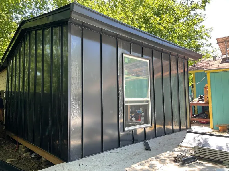 Black standing seam metal wall panels for Roof Inspection in Streamwood